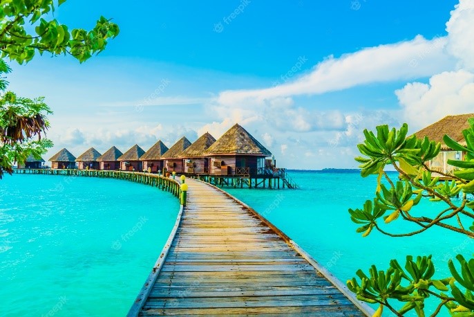 Luxurious overwater bungalow with a stunning view of the Indian Ocean in the Maldives.