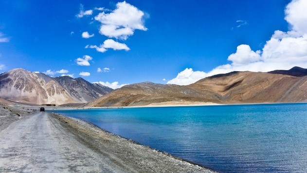 Serene Pangong Lake reflecting the surrounding peaks